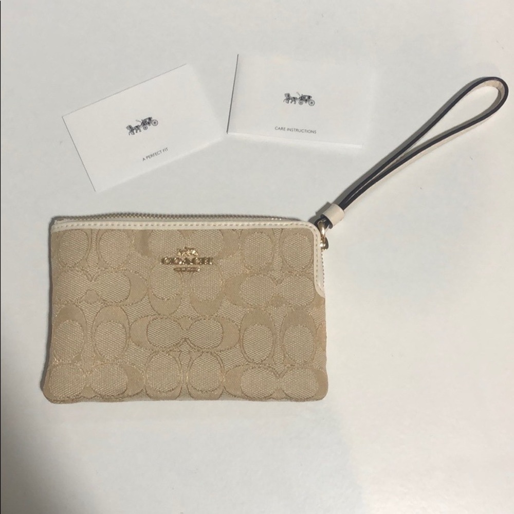 Coach signature canvas wristlet
